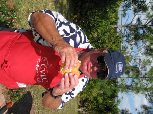 John enjoys the fruit of his labor.
